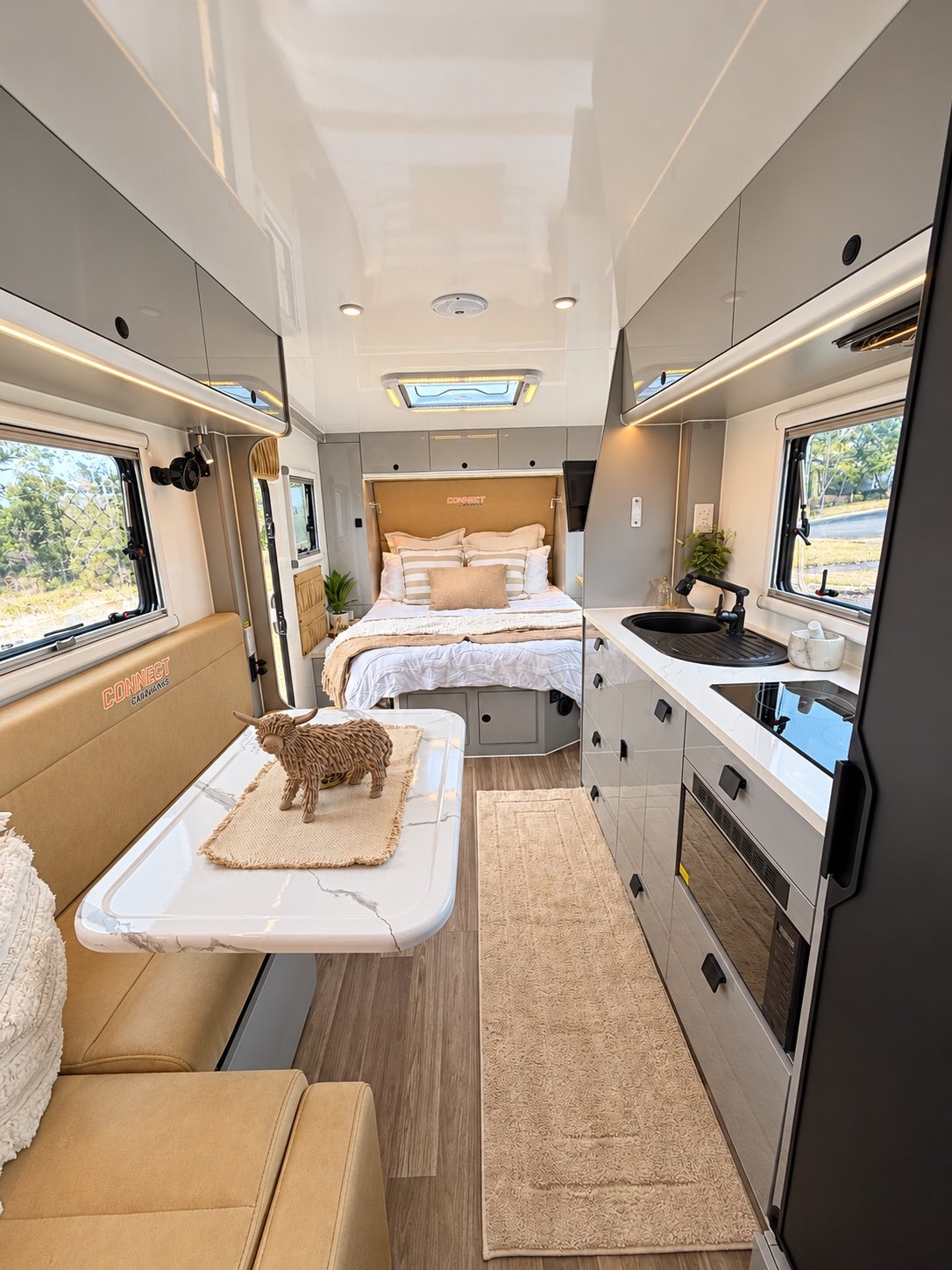 T17.5 Modern — Modern interior with tan seating and light cabinetry